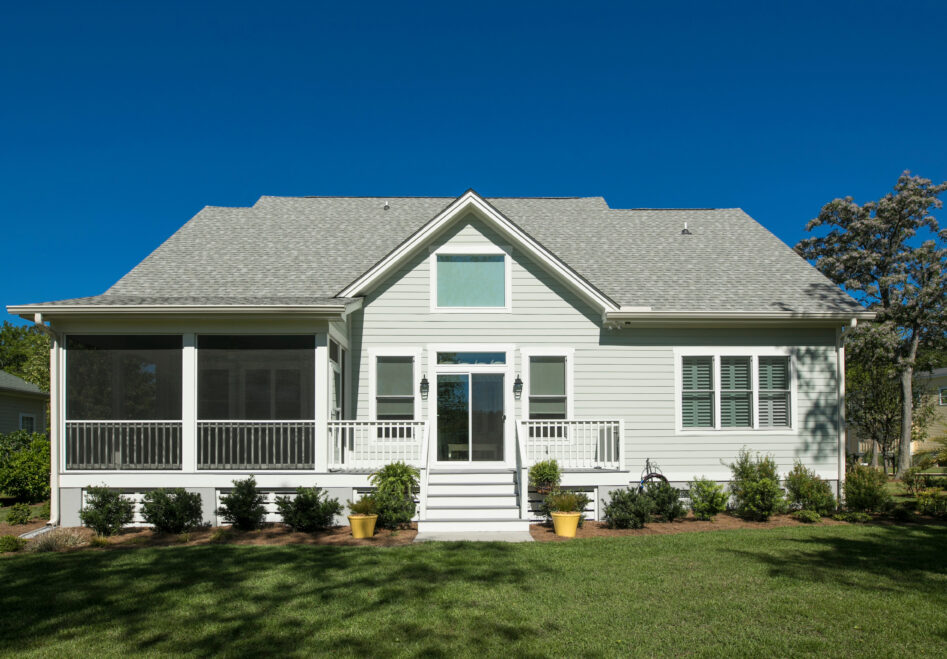 Rear elevation of beautiful home with landscaped garden. Rear elevation of beautiful home with landscaped garden.